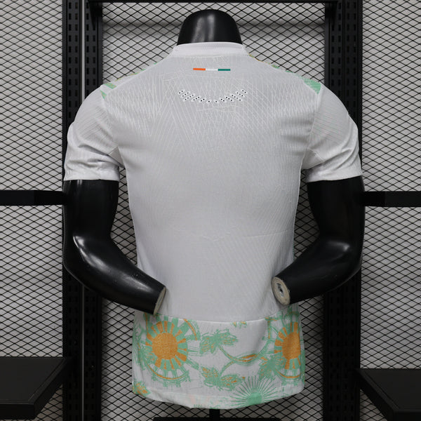 Mannequin wearing a white sports jersey with floral shorts against a black metal grid background