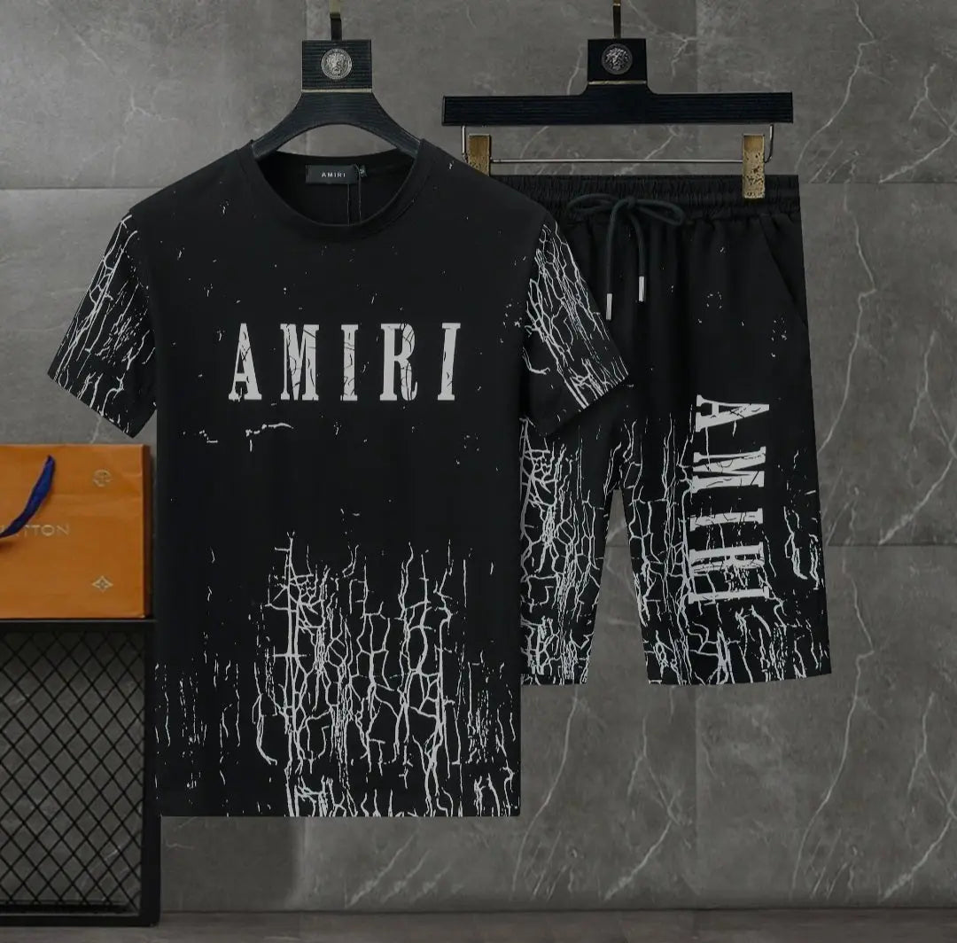 Black and white Amiri Cracked Designer T-shirts and shorts set . Buy 3 get 1 FREE Gorilla fits