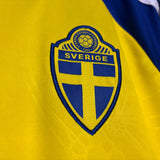 Sweden national team logo on a yellow sports jersey