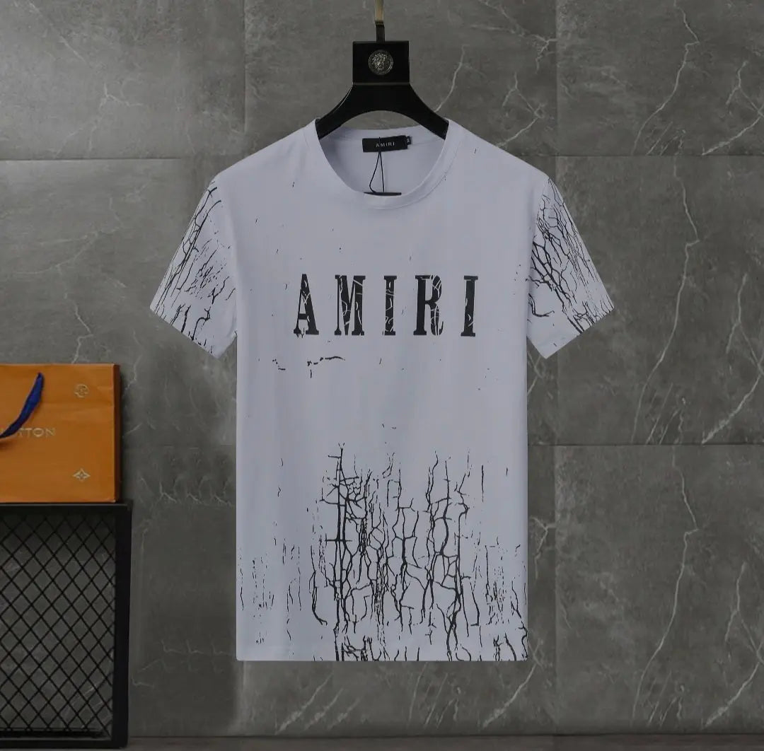 Black and white Amiri Cracked Designer T-shirts and shorts set . Buy 3 get 1 FREE Gorilla fits