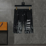 Black and white Amiri Cracked Designer T-shirts and shorts set . Buy 3 get 1 FREE Gorilla fits