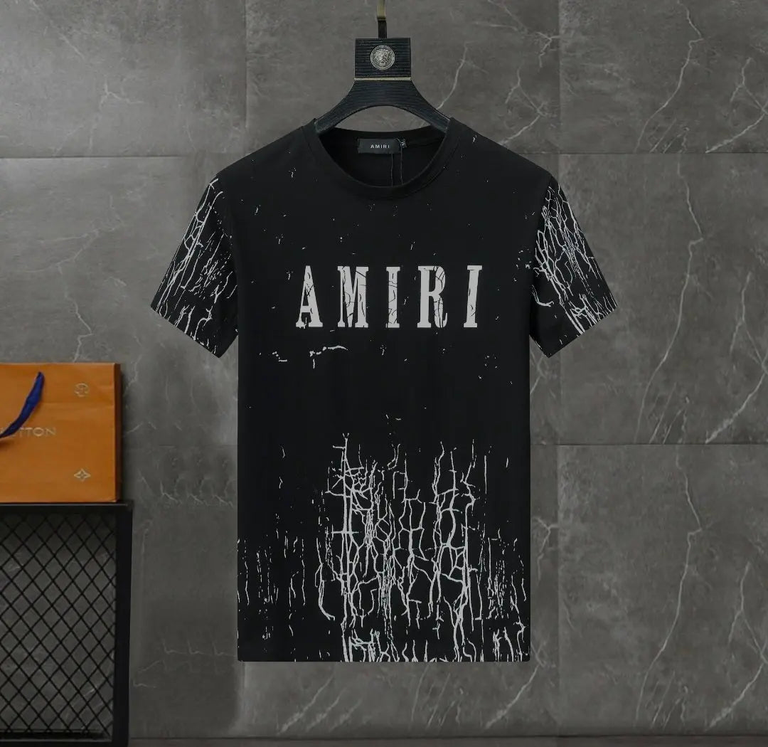 Black and white Amiri Cracked Designer T-shirts and shorts set . Buy 3 get 1 FREE Gorilla fits