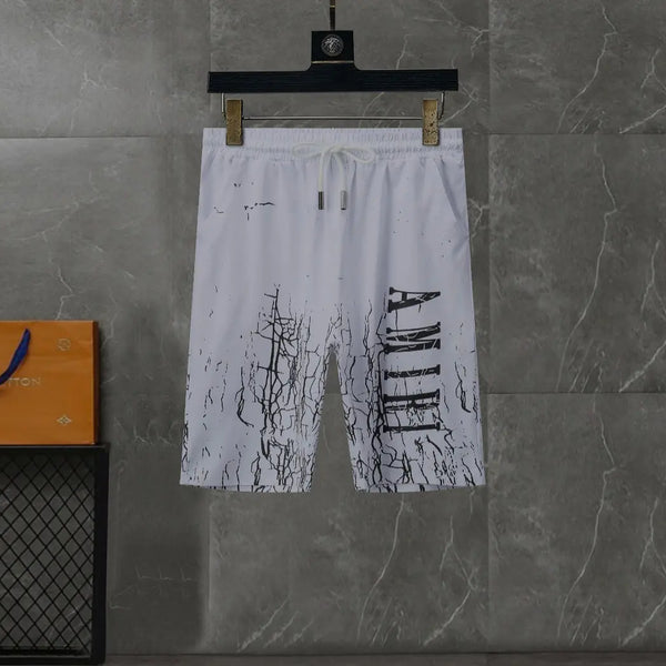 Black and white Amiri Cracked Designer T-shirts and shorts set . Buy 3 get 1 FREE Gorilla fits